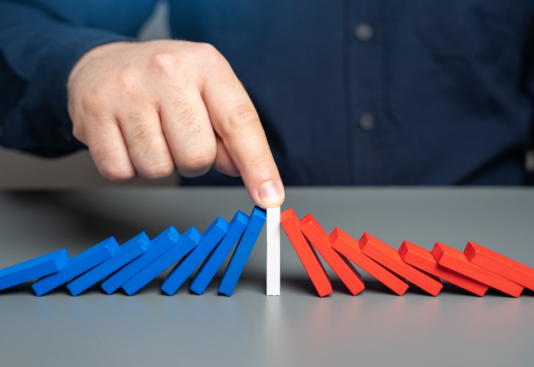 red and blue blocks falling into a center white block