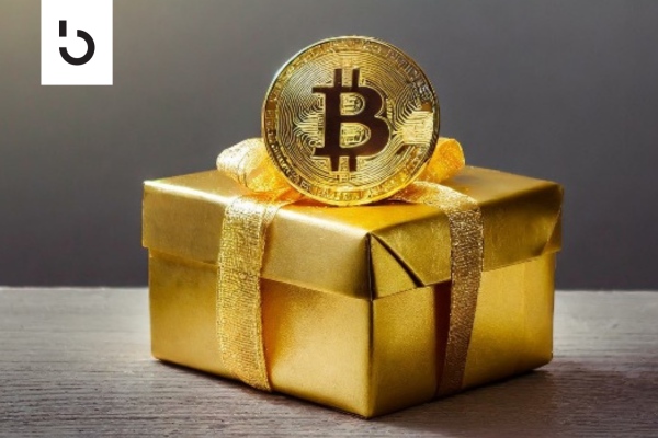 gold gift box and coin with bitcoin symbol